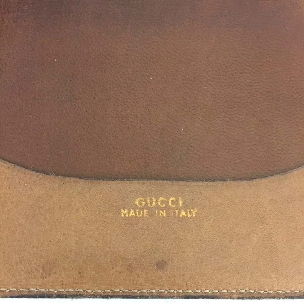 Early Gucci brown canvas with an orange diagonal GG logo print and camel leather bi-fold wallet